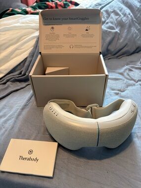 Therabody SmartGoggles Eye Massager in Light Gray and Cream